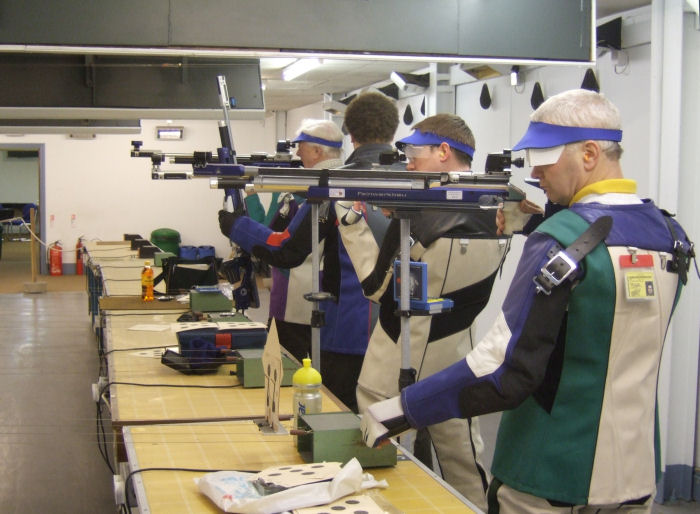 A group of air rifle shooters on the 10 metre range